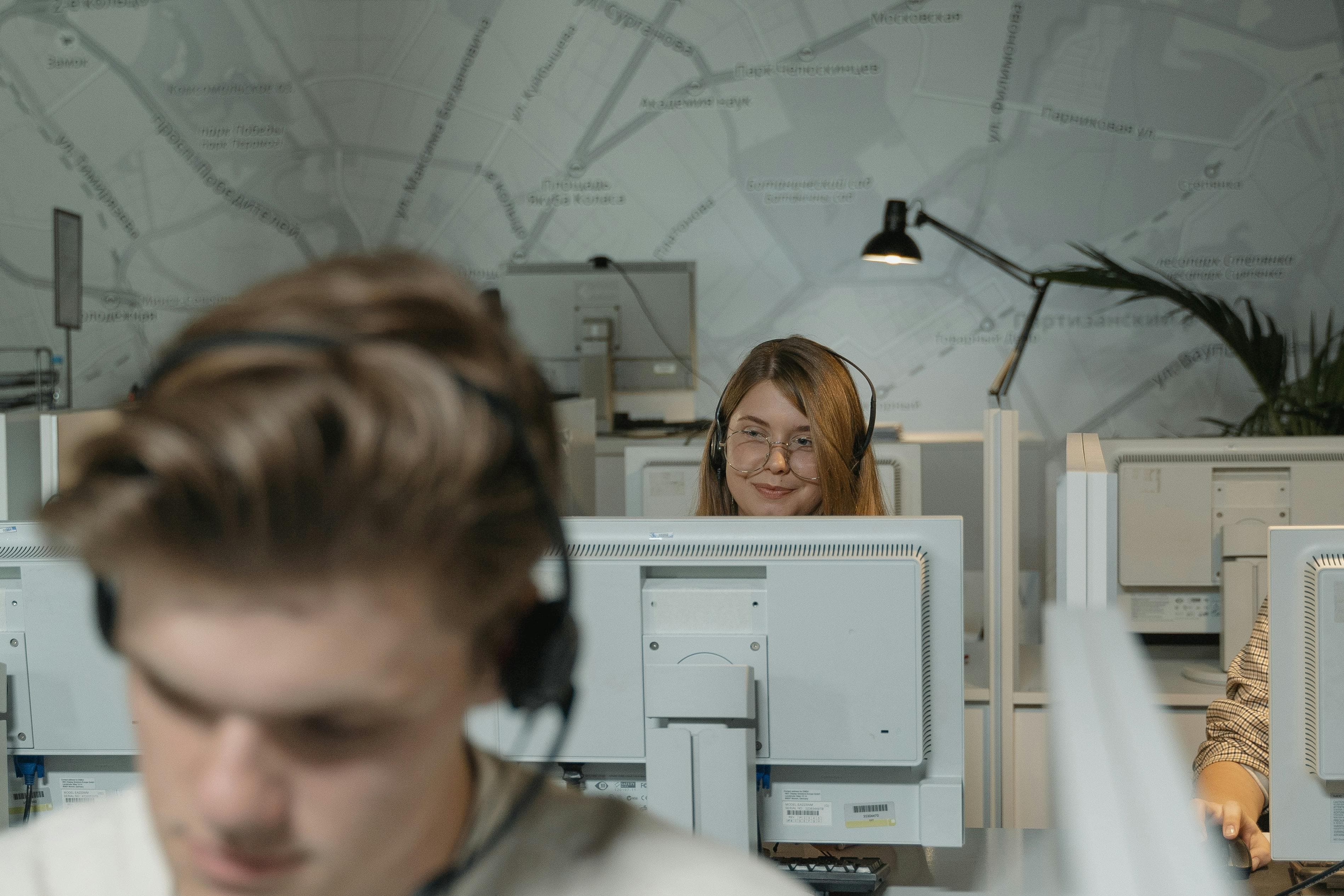 Dental office staff processing insurance claims on desktop computers - automated dental claims processing software